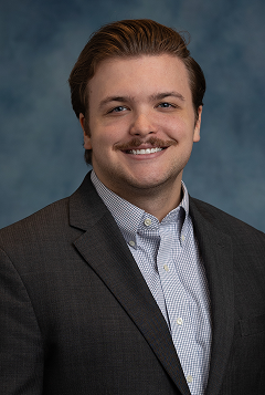 Logan, a trusted financial advisor at Forever Young, offering expert financial advice and planning services to clients in Jupiter, FL